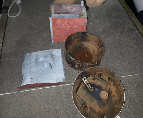 It took an entire afternoon and evening, a rented Sawzall, and several beers but they got it out!