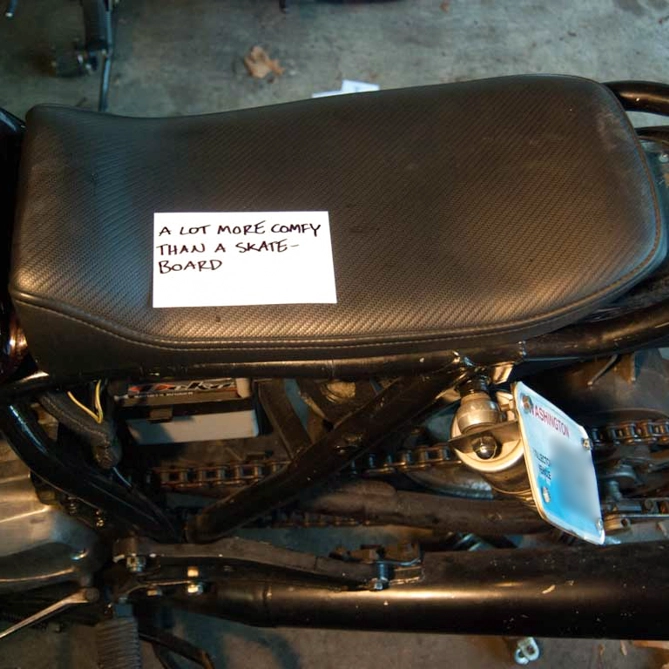 I took the fiberglass seat pan to a local upholsterer for foam and a custom vinyl cover.